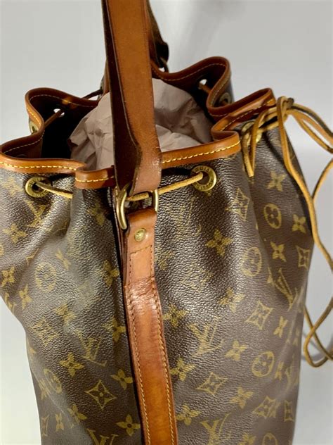 louis vuitton black leather bucket bag|Louis Vuitton drawstring bucket bag.